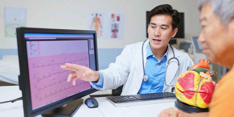 Doctor reviewing EKG with patient